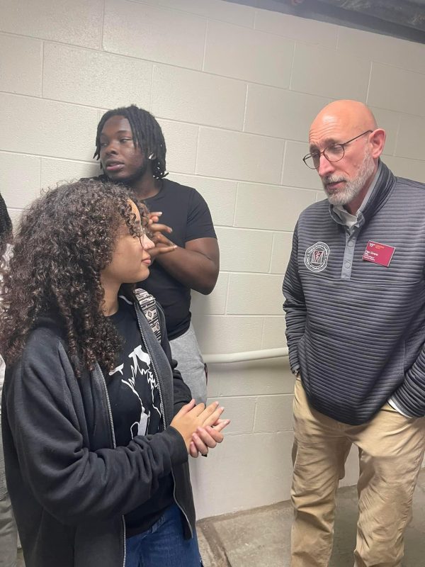 Students from Concord University's Upward Bound program talking to the Dean of the Virginia-Maryland College of Vet Medicine